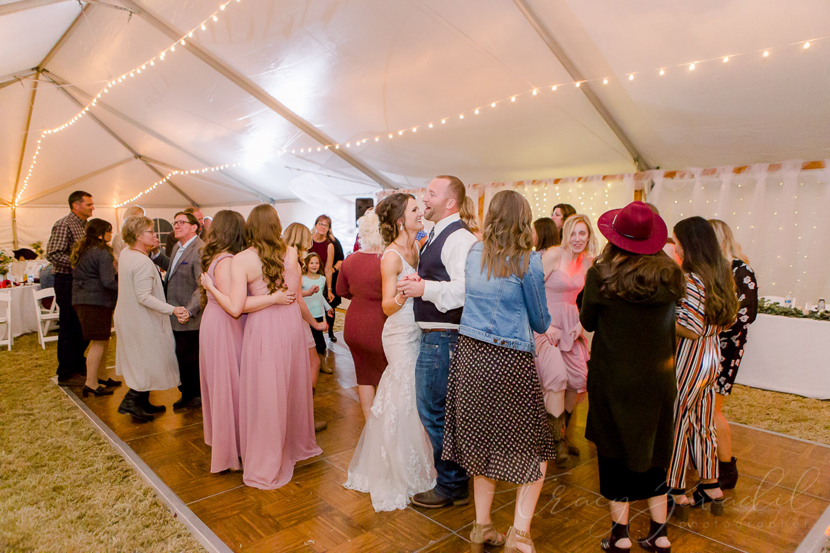 Bride and groom dancing