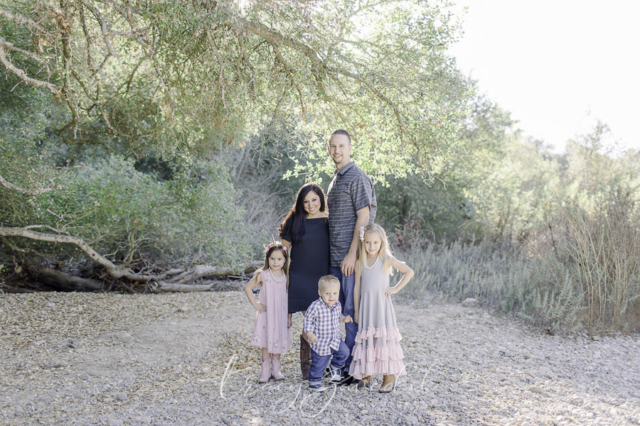 Family of 5 under tree